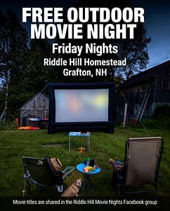 Outdoor movie screen at dusk during Riddle Hill Movie Nights in Grafton, New Hampshire, featuring a family-friendly movie under the stars.